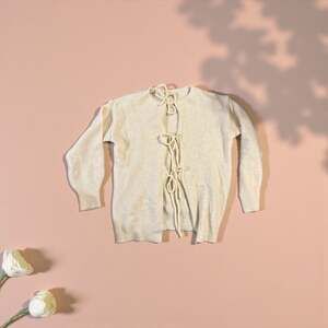 Oat Reversible Tie-Back Knit Sweater in Cream